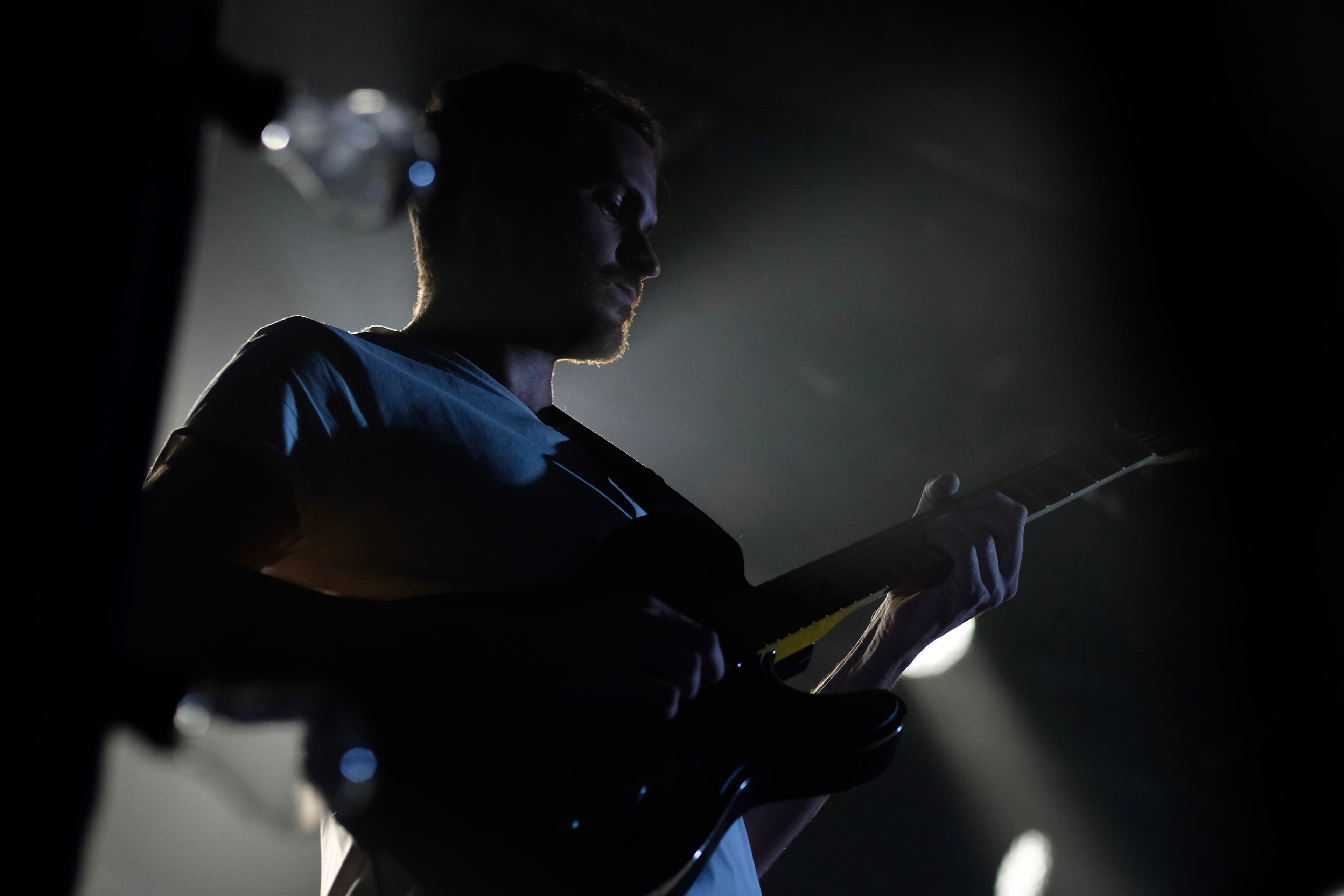 Silhouette of Stefano Rana performing live