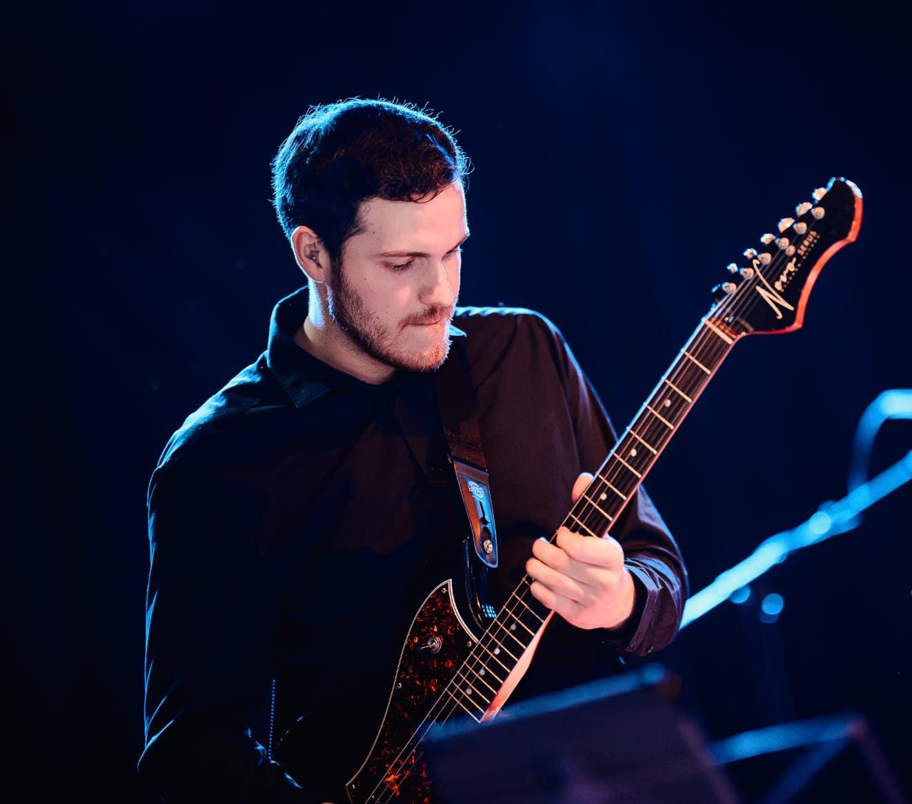 Stefano Rana playing guitar